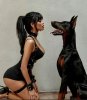 raven collar tight lbd cuffs open mouth sexy opposite dobermann dog.jpeg