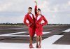 man & woman both dressed in stewardess skirt.jpg